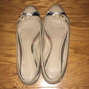 Authentic Burberry flats. Good condition.